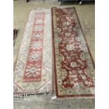 An Afghan Ziegler peach ground runner and another runner, largest 310 x 84cm