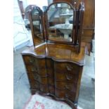 A Queen Anne Revival shaped front walnut chest, W.84cm D.49cm H.88cm, and a walnut triple dressing