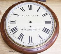 A Victorian mahogany circular wall clock, by G.J. Clark, pendulm but no key, diameter 38cmSingle