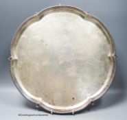 A late Victorian silver shaped circular salver, with engraved inscription, George Howson,