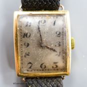 A gentleman's stylish 1920's 18ct gold Rolex manual wind curved case wrist watch, with silvered