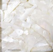 A quantity of assorted mother of pearl counters