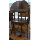 A George III oak and elm three tier corner washstand, W.56cm D.39cm H.110cm