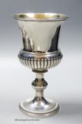 A late George III silver urn shaped goblet, with fluted belly, by William Eaton, London 1819, 19.