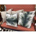 3 Christian Lacroix Palm cushions and 2 Oka cushions.