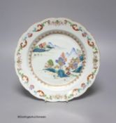 A Chinese Export famille rose plate, Qianlong period,with waved edge, polychrome-decorated with a