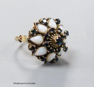 A yellow metal (stamped 18k), white opal and sapphire cluster set 'hareem' ring, size O, gross 6.6