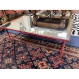 A Julien Chichester 'Richter' stitched leather mirrored coffee table. W-130, D-80, H-46cm.