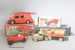 A Tri-ang Minic pre-war mechanical horse and tractor, a Tri-ang Minic fire engine and a penguin