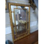 Three reproduction gilt framed wall mirrors, largest W.63cm H.85cm