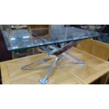 A modern plate glass topped coffee table, with a stainless steel underframe, W.120cm D.70cm H.51cm
