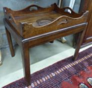 A 19th century rectangular mahogany butler’s tray occasional table, on associated stand, W.64cm D.