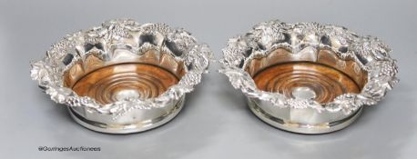 A pair of Victorian silver plated wine coasters, 19cm