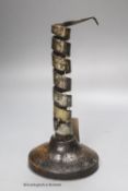 A late 17th century adjustable oak sheet-iron candlestick, height 20.5cm