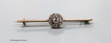 An early 20th century yellow metal and diamond cluster set bar brooch, 41mm, 2.2 grams.