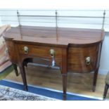 A George III mahogany breakfront sideboard, length 152cm, 116.5cm high to top brass rail, 76cm deep