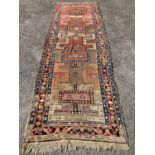 An early 20th century Caucasian Kazak hall carpet, 370 x 128cm