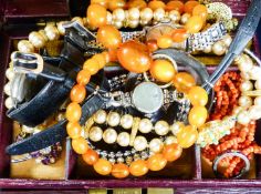 An amber necklace, 38cm, gross 22 grams and a quantity of assorted costume jewellery.