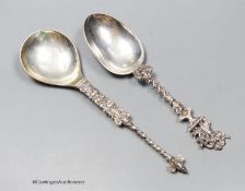 A late 19th century ornate Swedish white metal spoon, with demi-twist handle and mask terminal,