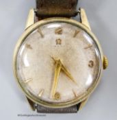 A gentleman's early 1950's gold plated Omega manual wind wrist watch, movement c.283, on associated