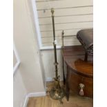 An Arts and Crafts brass telescopic standard lamp.