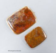 Two early 20th century yellow metal mounted agate shaped square brooches, largest 74mm, gross