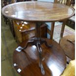 A George III mahogany birdcage tea table with circular tilt top, Diam.74cm H.74cm