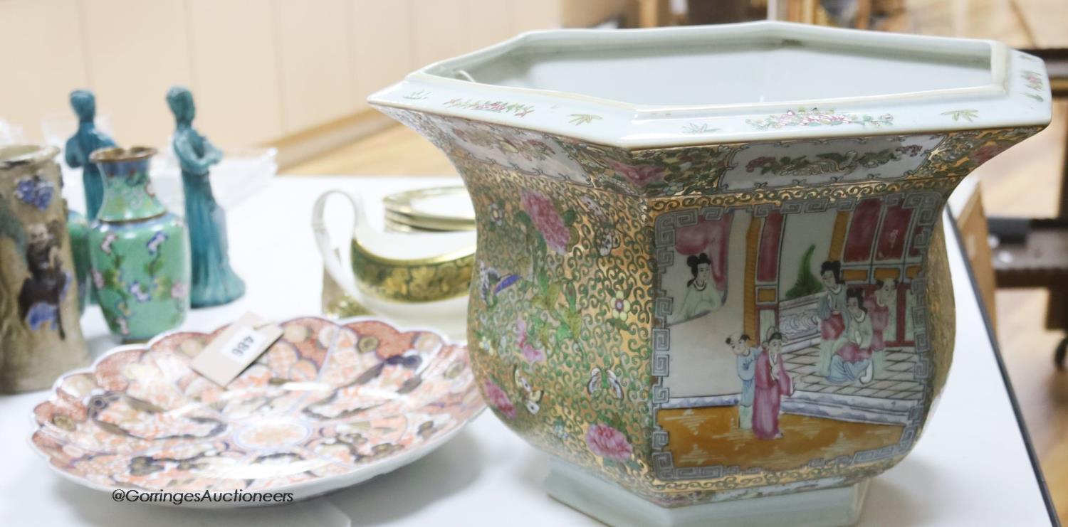 A Chinese famille rose jardiniere, height 29cm, and a Japanese imari dish