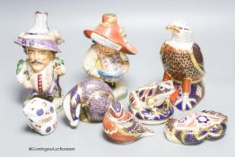 A Group of Royal Crown Derby animal and bird ceramic paperweights and two Mansion House dwarf