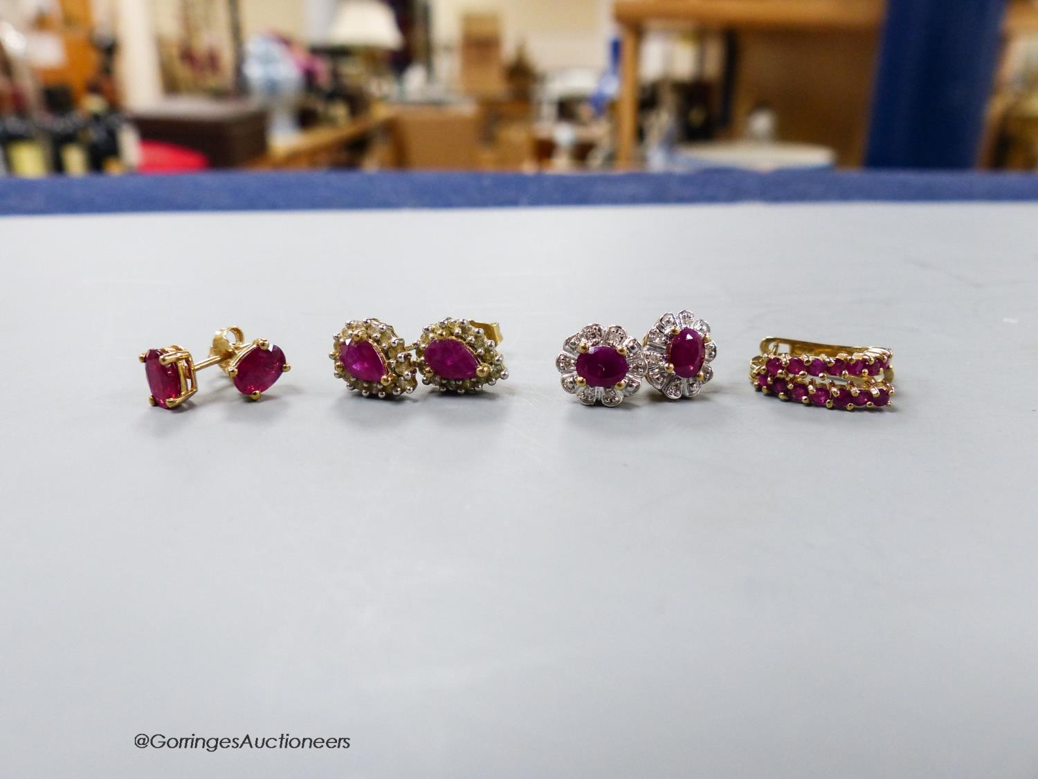 Four assorted modern pair of 9ct ruby or ruby and diamond set ear studs, gross 6.2 grams - Image 2 of 2