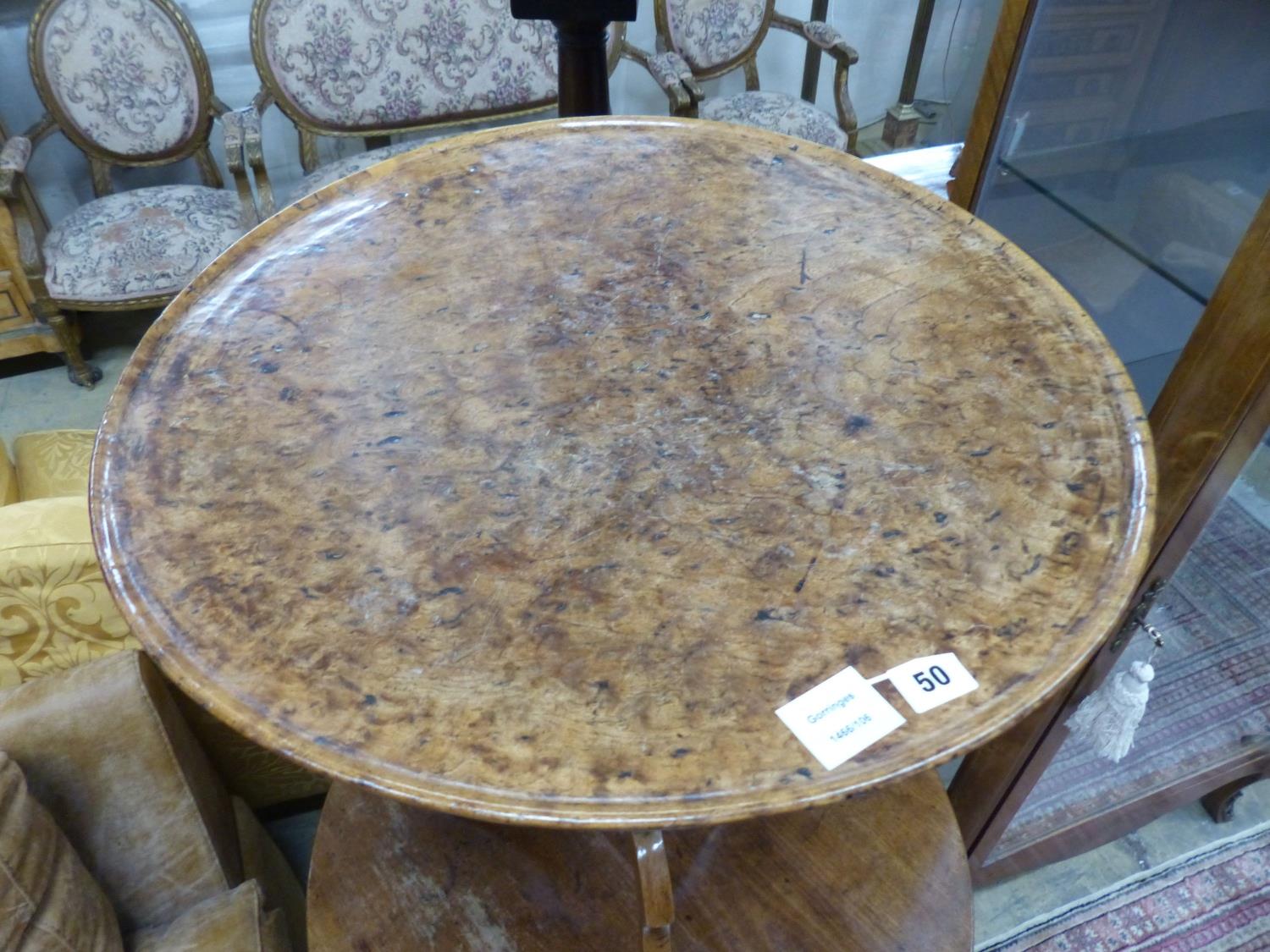 A George III oak and pollard oak circular tilt top tripod tea table (warped) Dia 57 H 67 cms. - Image 2 of 2