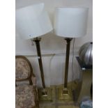 A pair of Corinthian column lamp standards, H.160cm