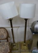 A pair of Corinthian column lamp standards, H.160cm