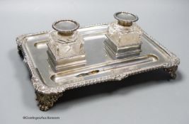 A late Victorian silver rectangular inkstand, with two mounted glass wells, Thomas Bradbury & Sons,