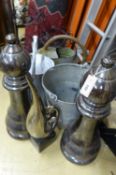 Assorted galvanized watering cans and assorted other metalware.