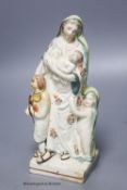 A Staffordshire pearlware group of a mother and children, c.1800, height 19cm
