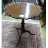 A George III and later mahogany tripod wine table, with piecrust top, Diam.50cm H.65cm