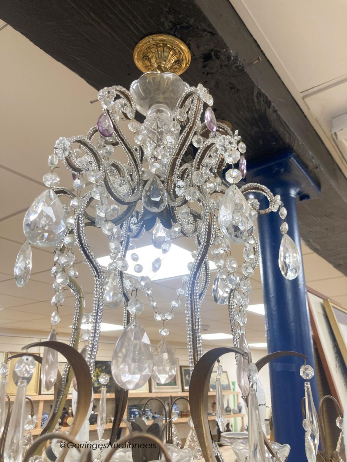 A gilt metal cut glass and lustre hung seven light chandelier84cm high - Image 3 of 3