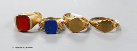 Four assorted 9ct signet rings, including lapis and carnelian, gross 10.8 grams.