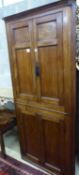 A George III mahogany four door standing corner cabinet, W.90cm D.48cm H.190cm