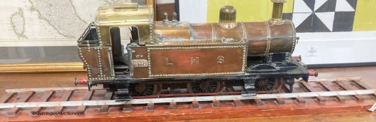 A mid 20th century scratch built 3 1/2" (9cm) gauge LMS 0-6-0 tank locomotive in copper, iron and