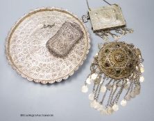 Two Middle Eastern white metal filigree trays, largest 24cm and two other Middle Eastern items.