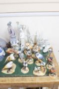 A collection of Royal Crown Derby models of birds (with boxes) and a group of Nao figures