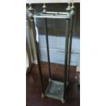 A tubular brass four division stick stand, H.66cm