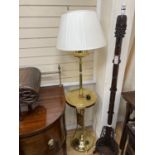 An early 20th century hammered brass standard lamp.