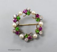 An early 20th century cultured pearl, garnet and diamond set clover cluster openwork brooch, 26mm,