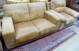 A contemporary tanned leather two seater sofa, length 156cm, depth 94cm, height 82cm and similar