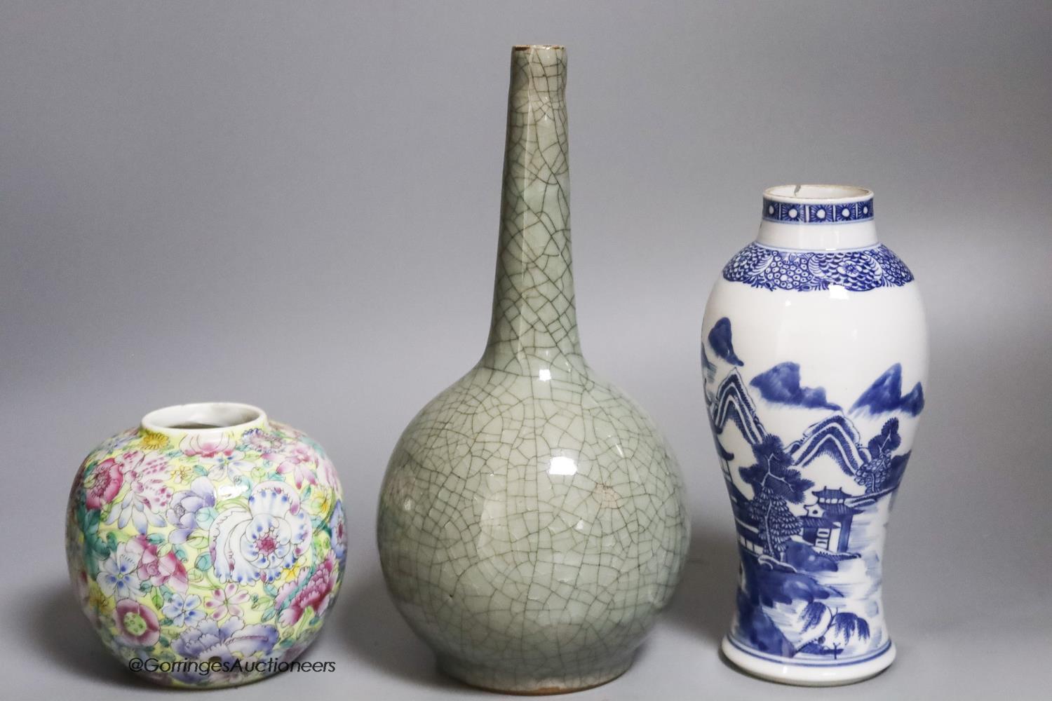 A Chinese crackleglaze bottle vase, a blue and white vase and a 'thousand flower' jar, tallest 24cm - Image 3 of 6