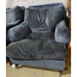 A George Smith armchair, re upholstered and on later feet.