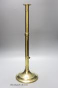 A 18th century brass ejector candlestick, height 50cm